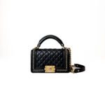 Chanel Boy Top Handle Flap Bag in Black Lambskin with Gold-Tone Hardware