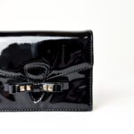 Valentino Garavani Studded Bow Wristlet Clutch – Black Patent - Image 2