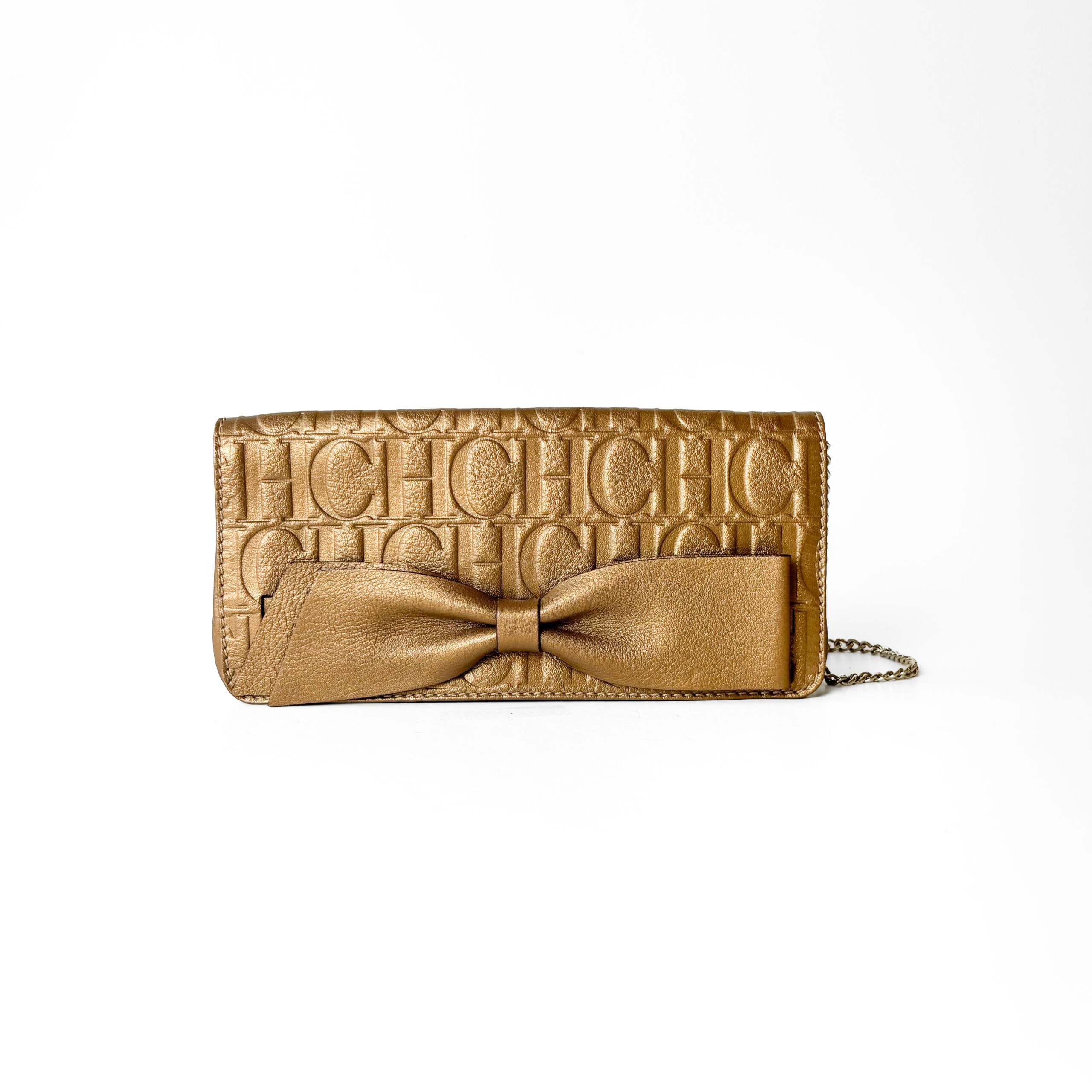 IMG_0091 Carolina Herrera Metallic Bronze/Gold Embossed Leather Bow Clutch - Image 1